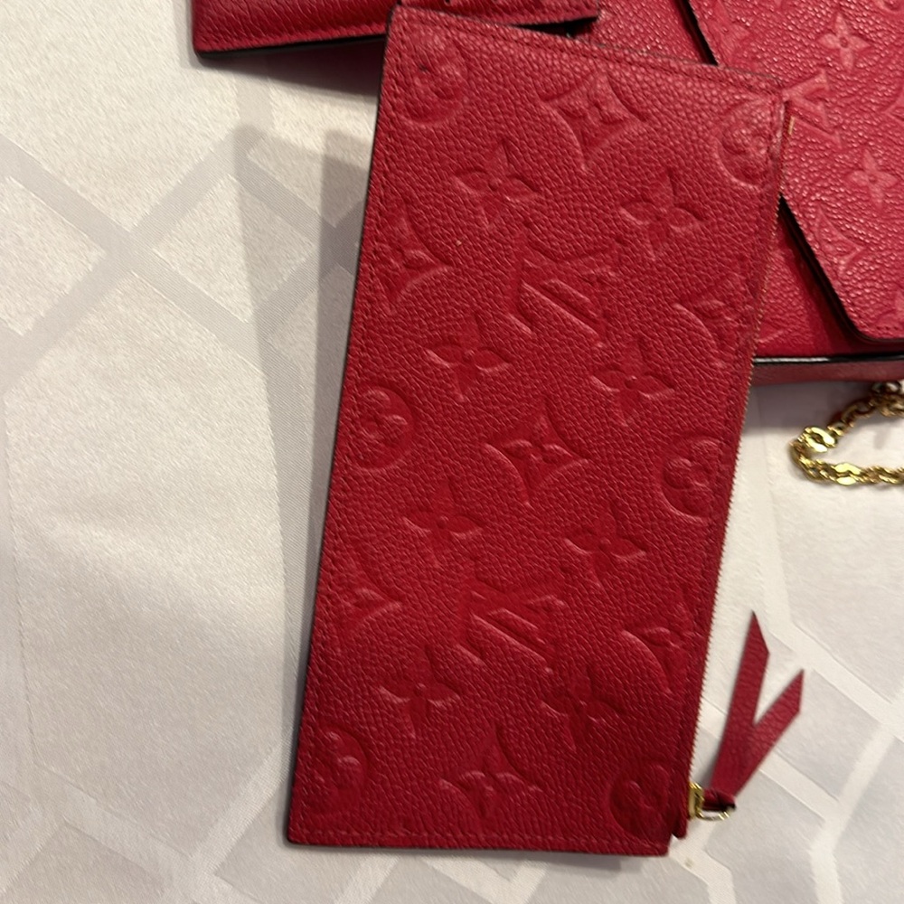 Louis Vuitton pouchette with wallet and pouch